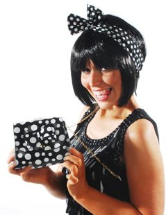 Black handbag with white dots
