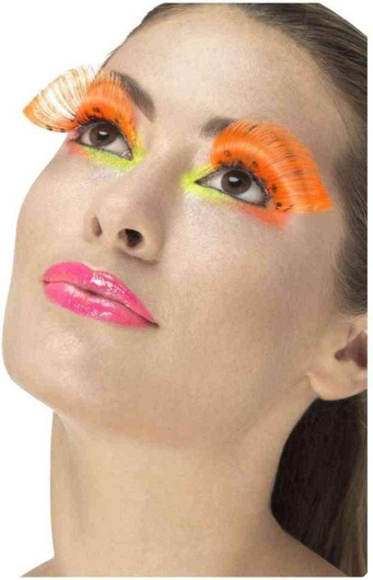 Cils avec des points d’orange
