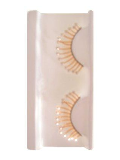 Cils orange avec des petits pois.