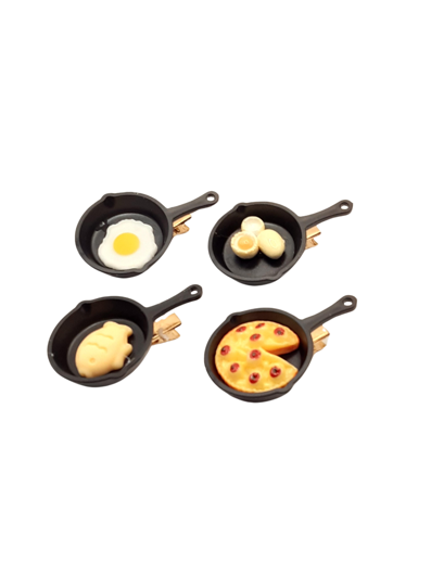 Frying pan skewers with omelette, fish and pizza.