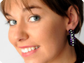 Oorbel zwart paars disco rings