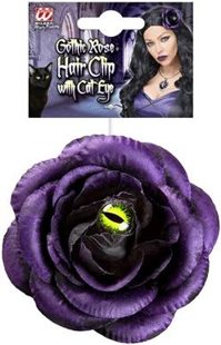 pince à cheveux avec fleur et œil violets