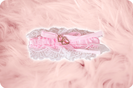 Roze kousenband luxe hartjes met steentjes