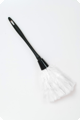 White feather duster