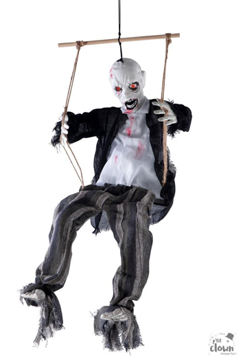 zombie doll on swing with movement light and sound